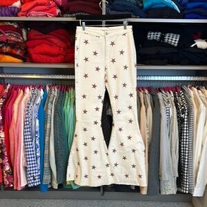 Peach Love ivory with mauve stars flare denim pants size M